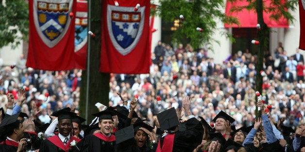 CAMBRIDGE, MA - JUNE 5: Harvard University Medical School graduates celebrate at commencement ceremonies by tossing 'giant p