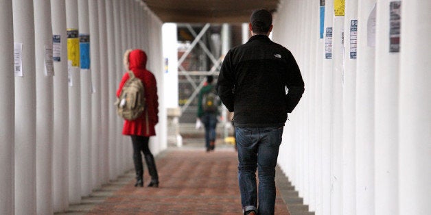 CHARLOTTESVILLE, VA - DECEMBER 6: Students walk through an outdoor corridor on the on the University of Virginia campus on December 6, 2014 in Charlottesville, Virginia. On Friday, Rolling Stone magazine issued an apology for discrepencies that were published in an article regarding the alleged gang rape of a University of Virginia student by members of the Phi Kappa Psi fraternity. (Photo by Jay Paul/Getty Images)