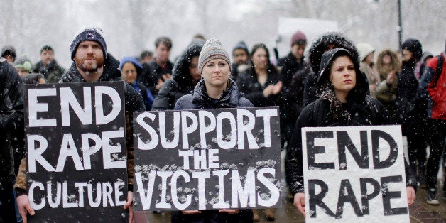 Students and others demonstrate on the Penn State campus in support of women police say were depicted on Kappa Delta Rho fraternity's private Facebook pages, Friday, March 20, 2015, in State College, Pa. Police are investigating allegations Kappa Delta Rho fraternity members used two secret Facebook pages to post photos of nude females, some of whom appeared to be sleeping or passed out, as well as posts relating to hazing or drug deals. (AP Photo/Matt Rourke)