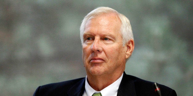 In this Friday, July 13, 2012 photo, Penn State University president Rodney Erickson, listens during a board of trustees meet