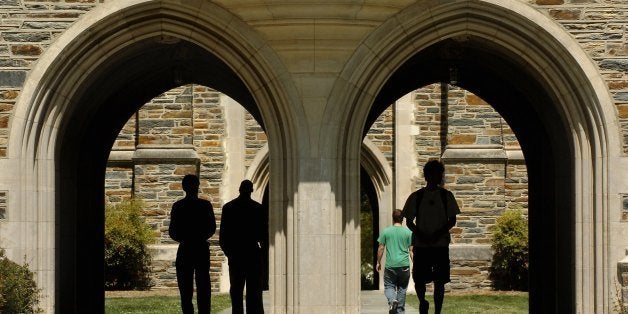 DURHAM, NC - APRIL 11: Students pass under the arches at Duke University Tuesday, April 11, 2006 in Durham, North Carolina
