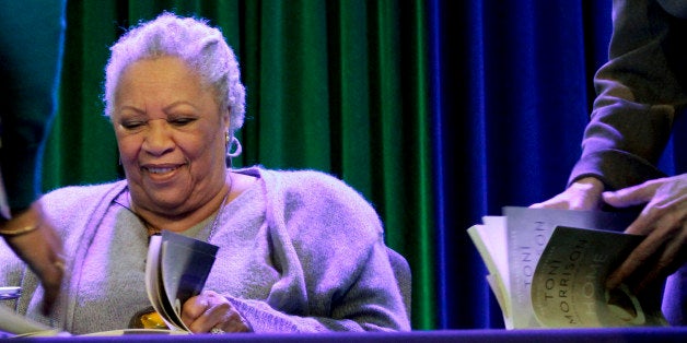 Author Toni Morrison signs copies of her latest book "Home," during Google's online program series, Authors At Google, on Wed