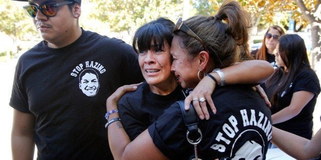 Family members of late Armando Villa, from left: Joshua Castaneda, his mother Martha Castaneda, and aunt, Maria Castaneda rea