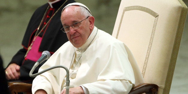 VATICAN CITY, VATICAN - AUGUST 05: Pope Francis attends his weekly audience at the Paul VI Hall on August 5, 2015 in Vatican City, Vatican. In his catechesis, Pope Francis noted that the Church in recent decades has developed a greater awareness of the need to be welcoming the divorced and re-married. He emphasized that they are still part of the Church, they are not excommunicated, and should not be treated as such, but rather must be encouraged, with their families to participate in the Church's life. (Photo by Franco Origlia/Getty Images)