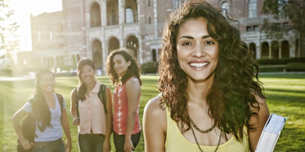 Student smiling on campus