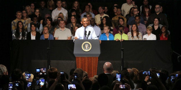 President Barack Obama speaks at Macomb County Community College Wednesday, Sept. 9, 2015, in Warren, Mich. Obama announces new steps to expand apprenticeships and a push to make community college free for responsible students. (AP Photo/Paul Sancya)