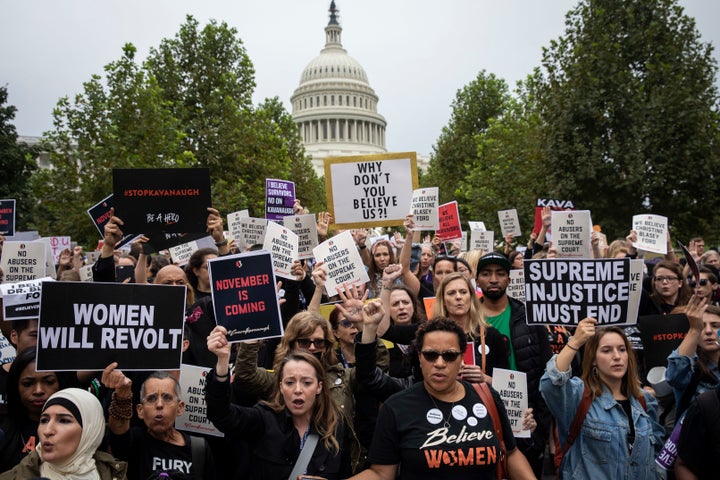 Protesters unite against Supreme Court nominee Brett Kavanaugh in a march on Capitol Hill on Sept. 27, 2018.