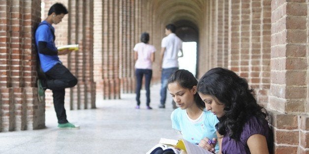 Group of Asian Students studying in college.