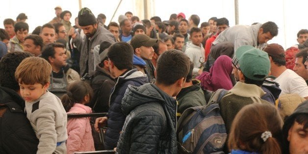 GEVGELIJA, MACEDONIA - NOVEMBER 19: Syrian refugees wait at the refugee camp in Gevgelija, Macedonia on November 19, 2015. (P