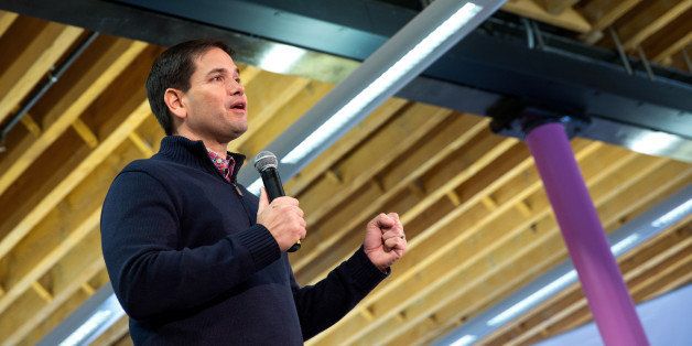 Senator Marco Rubio, a Republican from Florida and 2016 presidential candidate, speaks during a town hall meeting at the Maytag Innovation Center in Newton, Iowa, U.S., on Wednesday, Dec. 30, 2015. Rubio found himself under siege on two fronts Tuesday over his attendance record in the U.S. Senate as the Florida lawmaker embarked on a swing through snowy Iowa. Photographer: Scott Morgan/Bloomberg via Getty Images 