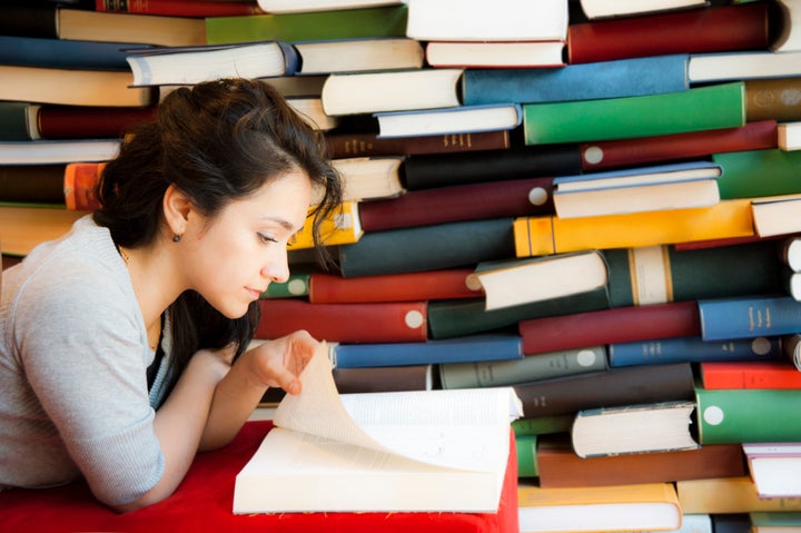 beautiful, happy girl in library