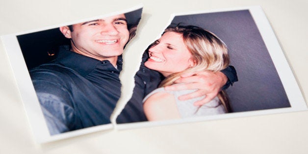 Photograph of couple ripped in half