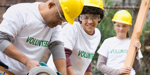 Volunteers working on construction site