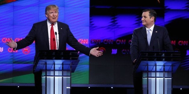 Republican presidential candidate, businessman Donald Trump speaks, as Republican presidential candidate, Sen. Ted Cruz, R-Texas, listens, during the Republican presidential debate sponsored by CNN, Salem Media Group and the Washington Times at the University of Miami, Thursday, March 10, 2016, in Coral Gables, Fla. (AP Photo/Wilfredo Lee)