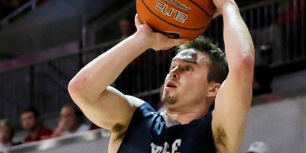 FILE - In this Nov. 22, 2015 file photo, Yale's Jack Montague attempts a shot during an NCAA college basketball game against SMU in Dallas. Expelled Yale player Montague, dismissed in February 2016 because of a sexual assault allegation, was in the stands Thursday, March 17, watching the Bulldogs take on Baylor in the NCAA Tournament in Providence, R.I. (AP Photo/Tony Gutierrez, File)