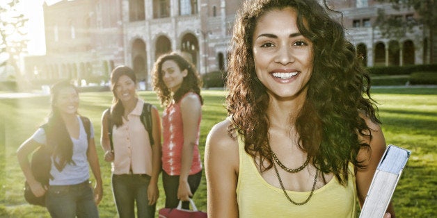 Student smiling on campus