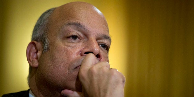 Jeh Johnson, U.S. secretary of Homeland Security (DHS), listens during a House Homeland Security Committee hearing in Washington, D.C., U.S., on Tuesday, Dec. 2, 2014. Johnson and Deputy Homeland Security Secretary Alejandro 'Ali' Mayorkas were leading architects of Obama's recently announced policy protecting as many as 5 million undocumented immigrants from deportation. Photographer: Andrew Harrer/Bloomberg via Getty Images 