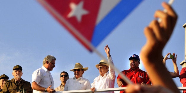 HAVANA, May 1, 2016-- Cuban leader Raul Castro, center, the Second Secretary of the Communist Party of Cuba Jose Ramon Machad