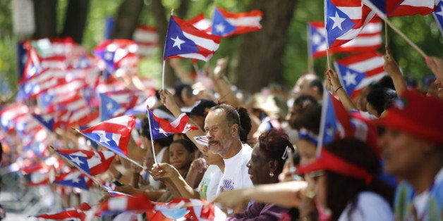 MANHATTAN, NEW YORK CITY, NEW YORK, UNITED STATES - 2016/06/12: Hundreds of thousands filled the streets of Manhattan & Brooklyn to celebrate NYC's 59th annual Puerto Rico Day starting with a parade led by mayor Bill de Blasio, who later held a brief press conference to discuss potential terrorism issues in light of the Orlando nightclub massacre. (Photo by Andy Katz/Pacific Press/LightRocket via Getty Images)