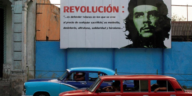 A mural with an image of Revolutionary fighter Ernesto "Che" Guevara is seen on a street in Havana May 18, 2016. REUTERS/Enrique de la Osa