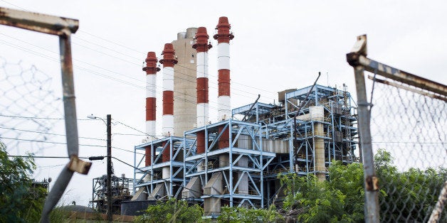 The Puerto Rico Electric Power Authority (PREPA) thermoelectric plant stands San Juan, Puerto Rico, on Saturday, April 30, 2016. Puerto Rico said its Government Development Bank, which is operating in a state of emergency to preserve its dwindling cash, reached an agreement with some credit unions to delay $33 million of bond payments as the commonwealth rushes toward a potential historic default. Photographer: Erika P. Rodriguez/Bloomberg via Getty Images