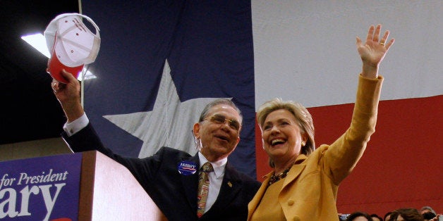 U.S. Democratic presidential candidate Senator Hillary Clinton (D-NY) waves with Congressman Ruben Hinojosa (D-TX) (L) at a campaign event in McAllen, Texas February 13, 2008. REUTERS/Jessica Rinaldi (UNITED STATES) US PRESIDENTIAL ELECTION CAMPAIGN 2008 (USA)