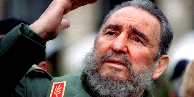 Cuba's President Fidel Castro gestures during a tour of Paris in this March 15, 1995 file photo. Ailing Cuban leader Castro said on February 19, 2008 that he will not return to lead the country, retiring as head of state 49 years after he seized power in an armed revolution. REUTERS/Charles Platiau/Files TPX IMAGES OF THE DAY