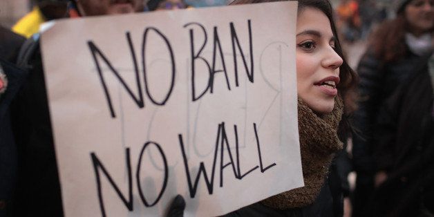CHICAGO, IL - FEBRUARY 01: Several hundred demonstrators protest President Donald Trump's executive order which imposes a freeze on admitting refugees into the United States and a ban on travel from seven Muslim-majority countries at the international terminal at O'Hare Airport on February 1, 2017 in Chicago, Illinois. The demonstrators rallied in front of the Department of Homeland Security offices and marched through the Loop during rush hour to the Federal Building Plaza. (Photo by Scott Olson/Getty Images)