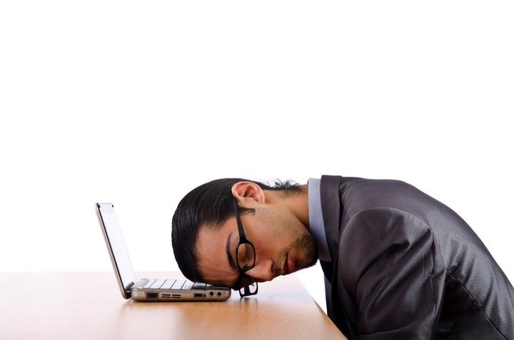 businessman sitting at the desk