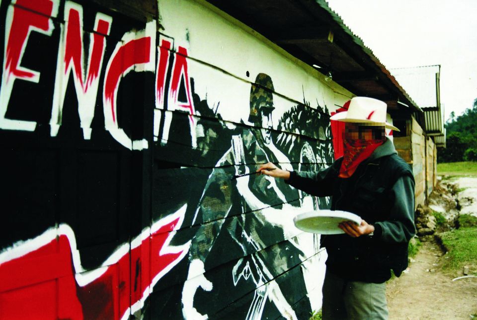 Photos Of Young Banksy Painting Mural In Mexico