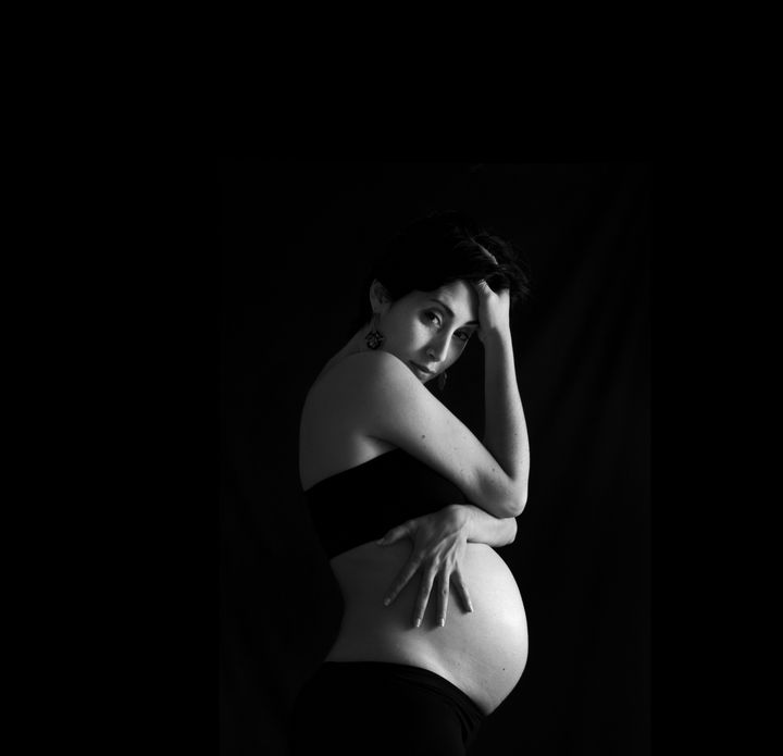 portrait of young pregnant...