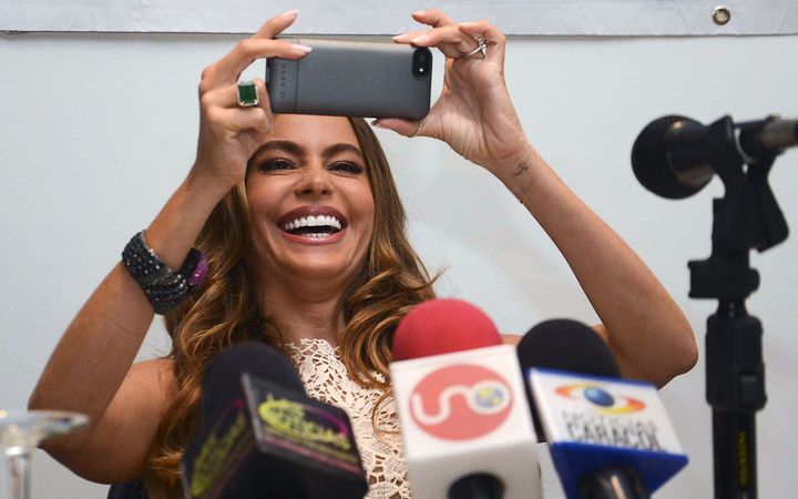 Colombian actress Sofia Vergara takes a picture during a press conference in Barranquilla, Colombia on April 7, 2013. Vergara is in Barranquilla for the commemoration of the 200 years of the city. AFP PHOTO/ STR (Photo credit should read STR/AFP/Getty Images)