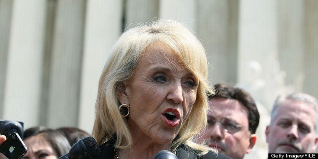 WASHINGTON, DC - APRIL 25: Arizona Gov. Jan Brewer speaks to the media after arguments at the U.S. Supreme Court, on April 25, 2012 in Washington, DC. This morning the high court will heard arguments on Arizona v. United States and will be tasked with deciding the conflicting roles of national and state governments in controlling the lives of noncitizens living illegally in the U.S.while deciding the constitutionality of Arizona's immigration law SB 1070. (Photo by Mark Wilson/Getty Images)