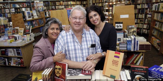 Marta O. Salvat, (l-r), her husband, Juan Manuel Salvat, and daughter, Marta Salvat-Golik, stand in the Libreria Universal which features books in Spanish. (Photo by Nuri Vallbona/Miami Herald/MCT via Getty Images)