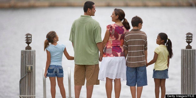 Rear view of multi-ethnic family