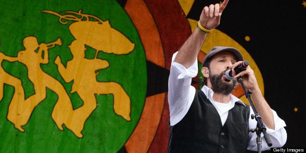 NEW ORLEANS, LA - APRIL 28: Vocalist Juan Luis Guerra performs during the 2013 New Orleans Jazz & Heritage Music Festival at Fair Grounds Race Course on April 28, 2013 in New Orleans, Louisiana. (Photo by C Flanigan/FilmMagic)