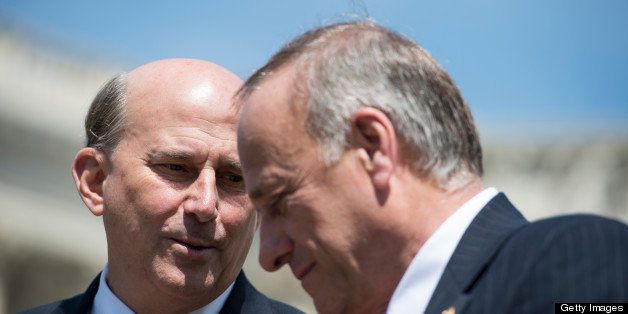 UNITED STATES - MAY 14: Rep. Louie Gohmert, R-Texas, left, and Rep. Steve King, R-Iowa, hold a news conference at the House Triangle on immigration reform on Tuesday, May 14, 2013 . (Photo By Bill Clark/CQ Roll Call)