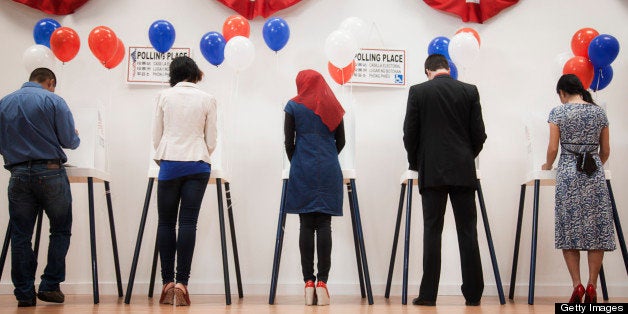 Voters voting in polling place