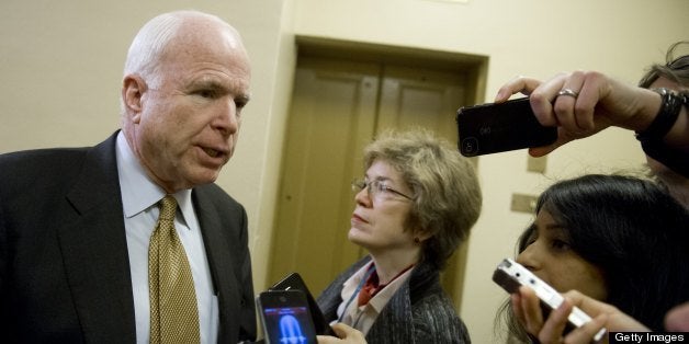 US Senator John McCain, Republican of Arizona, speaks to the media about the Senate's immigration reform bill at the US Capitol in Washington, DC, on April 16, 2013. AFP PHOTO / Saul LOEB (Photo credit should read SAUL LOEB/AFP/Getty Images)