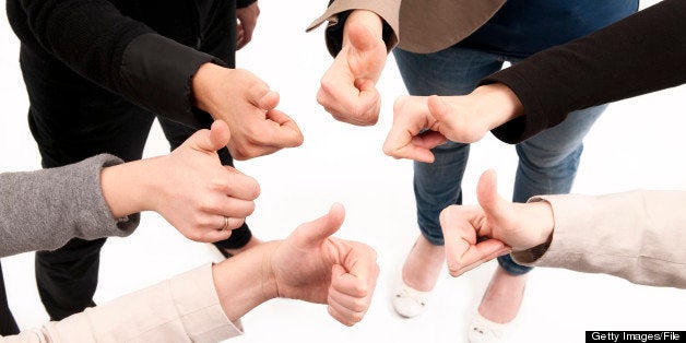 Group of women Thumbs Up