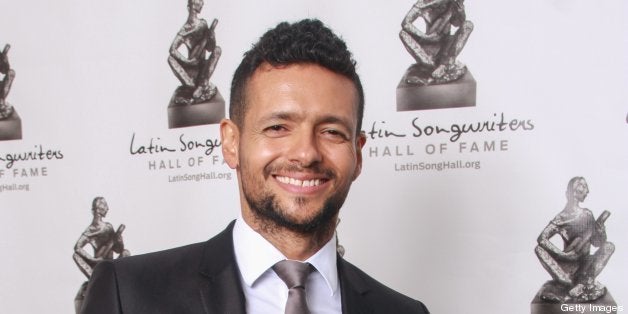 MIAMI BEACH, FL - APRIL 23: Draco Rosa poses backstage after he receives Premio Conquistador at the Latin Songwriters Hall of Fame Gala at New World Center on April 23, 2013 in Miami Beach, Florida. (Photo by John Parra/Getty Images)