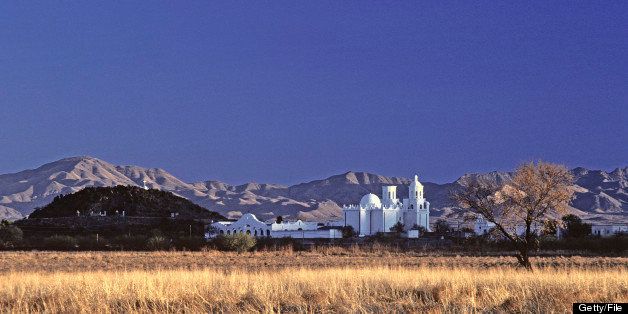 Mission San Xavier del Bac in late afternoon light with backdrop of the Santa Rita Mountains, Tucson, Arizona, USA, (Photo by Wild Horizons/UIG via Getty Images)