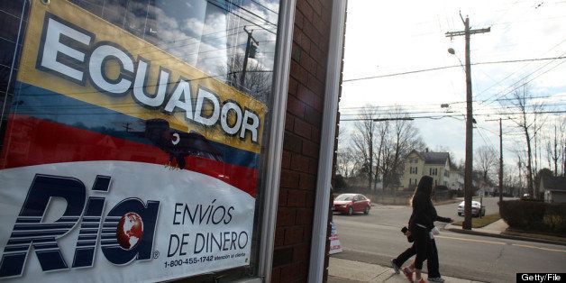 EAST HAVEN, CT - FEBRUARY 01: An Ecuadorian sign is viewed in a window of a store on February 1, 2012 in East Haven, Connecticut. Following an investigation by the FBI, four East Haven police officers were arrested last week and accused of abusing Latinos in the working class community of 28,000 people which was nearly predominately white a generation ago. A recent civil rights investigation which was released last month revealed a pattern of discriminatory policing East Haven and the town has been warned by the U.S. Justice Department to make reforms. The arrested officers have been accused of subjecting Hispanics to beatings and false arrests among other things. Currently East Haven's Latino population is around 10 percent. (Photo by Spencer Platt/Getty Images)