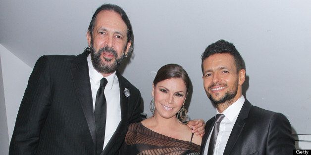 MIAMI BEACH, FL - APRIL 23: Juan Luis Guerra, Olga Tanon and Draco Rosa pose backstage at the Latin Songwriters Hall of Fame Gala at New World Center on April 23, 2013 in Miami Beach, Florida. (Photo by John Parra/Getty Images)