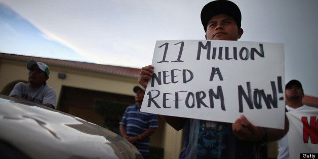 HOMESTEAD, FL - MAY 11: Raul Pop holds a sign reading '11 million need a reform now!' as he and others participate in a rally calling on President Barack Obama to immediately suspend deportations and for Congress to pass an immigration reform that?s inclusive of all 11 million undocumented people in the U.S. on May 11, 2013 in Homestead, Florida. The rally is part of what is being called a rolling fast in different places throughout the nation over the course of the next two months to bring what organizers say is a moral, prophetic voice to the immigration debate. (Photo by Joe Raedle/Getty Images)