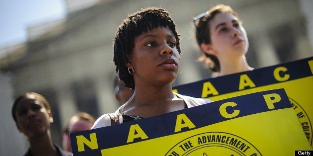 Jessica Pickens, 19, of Chicago, IL stands with fellow voting rights activists outside the U.S. Supreme Court on Tuesday, June 25, 2013, in Washingto, DC, the day the court ruled on the Voting Rights Act striking down portions of the law. (Pete Marovich/MCT via Getty Images)