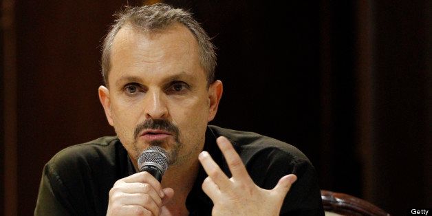 Spanish singer Miguel Bose speaks during a press conference April 18, 2010 in Santo Domingo, to publicize the charity concert 'Un canto de esperanza por Haiti' (A Song of Hope For Haiti), to be offered by several renowned artists today to raise funds to build a child hospital in Port-au-Prince. AFP PHOTO/Erika SANTELICES (Photo credit should read ERIKA SANTELICES/AFP/Getty Images)