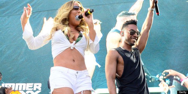 EAST RUTHERFORD, NJ - JUNE 02: (L-R) Mariah Carey and Miguel perform during HOT 97 Summer Jam XX at MetLife Stadium on June 2, 2013 in East Rutherford, New Jersey. (Photo by Johnny Nunez/WireImage)
