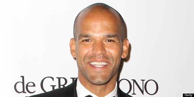 Actor Amaury Nolasco poses for a photocall as he arrives for the jewelry company de Grisogono's 20th anniversary cocktail, a