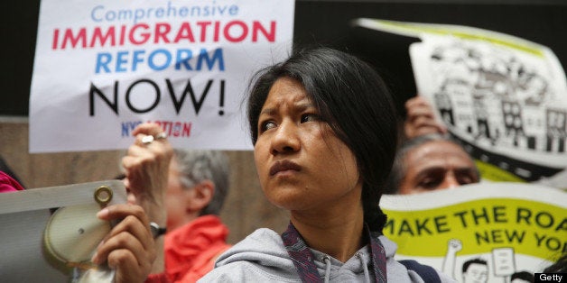 NEW YORK, NY - JUNE 14: Immigration reform advocates stage a demonstration, organized by the New York Immigration Coalition, outside a detention facility run by Immigration and Customs Enforcement (ICE) on June 14, 2013 in New York City. Demonstrators staged the event ahead of Fathers' Day to draw attention to the thousands of undocumented immigrant fathers deported by ICE and separated from their families in the United States. (Photo by John Moore/Getty Images)